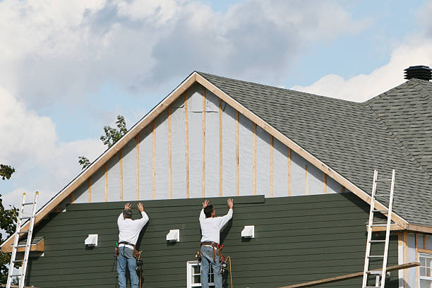 Professional Siding Contractor technician working in Andover, CT